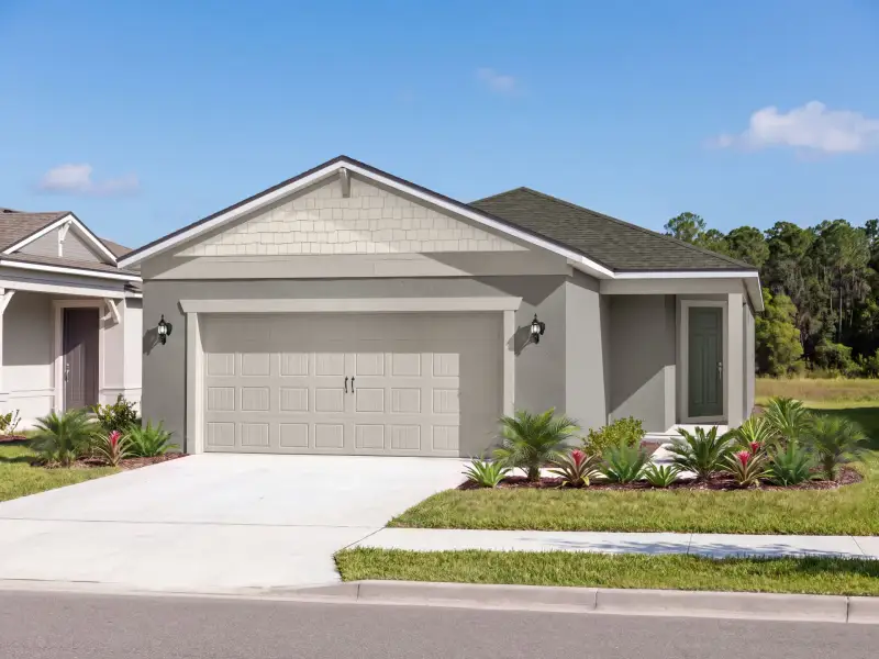 Representative exterior photo of a completed home built from the Glenhollow by Del Webb in Del Webb Flagler Beach, Palm Coast, FL (Image 4). Representative exterior photo of a completed home built from the Glenhollow by Del Webb in Del Webb Flagler Beach, Palm Coast, FL (Image 4).