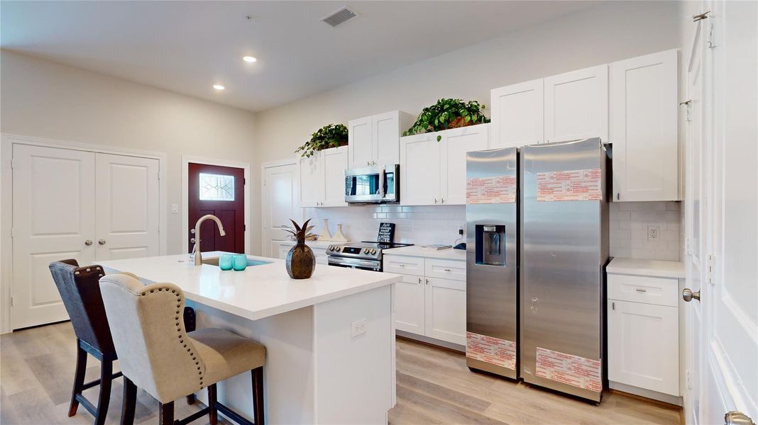 Furnished interior view inside a new home in , The Woodlands (Image 9).