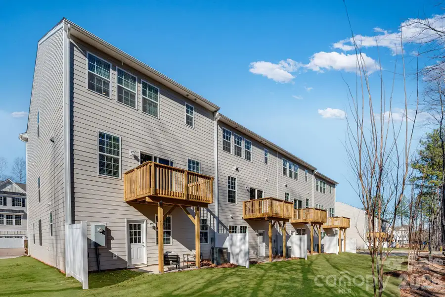 Exterior details and patio area of a home in Village of Waxhaw, Waxhaw (Image 3).