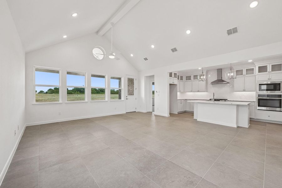 Open great room with high vaulted ceilings