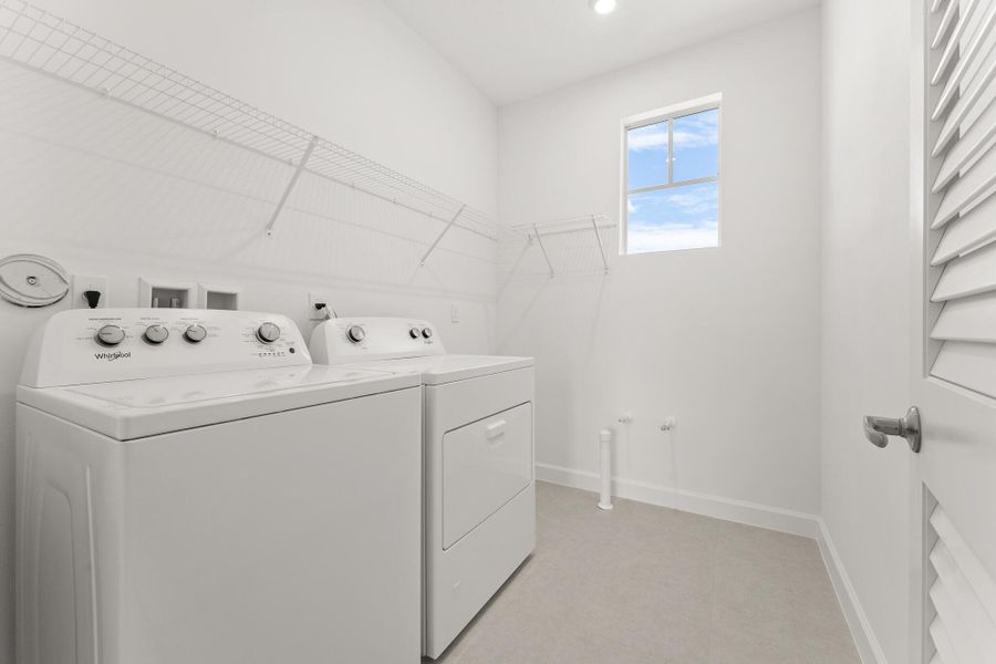 Furnished interior view inside a new home in Tradition - Kenley, Port St. Lucie (Image 4). Furnished interior view inside a new home in Tradition - Kenley, Port St. Lucie (Image 4).