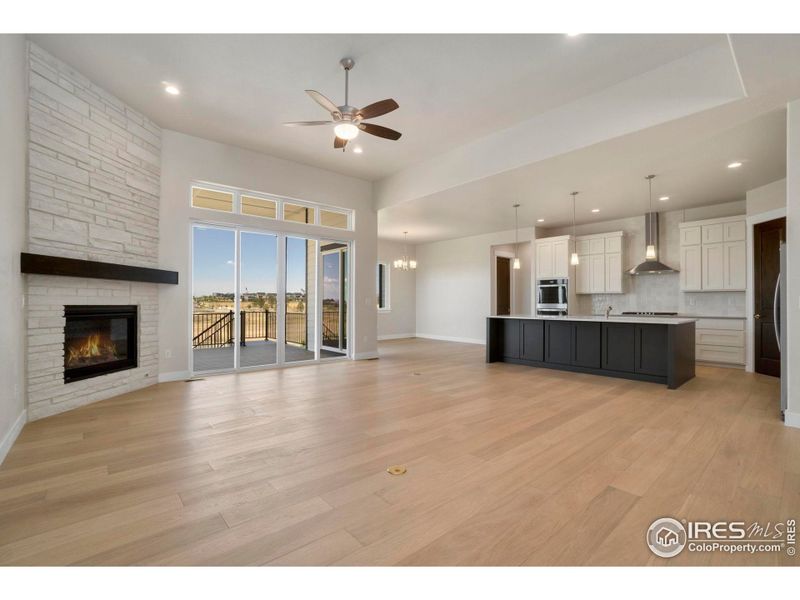 Great Room with Gas Fireplace and Trinsic Sliding Glass Door