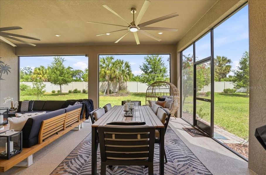 Exterior details and patio area of a home in Esplanade at Artisan Lakes, Palmetto (Image 3).