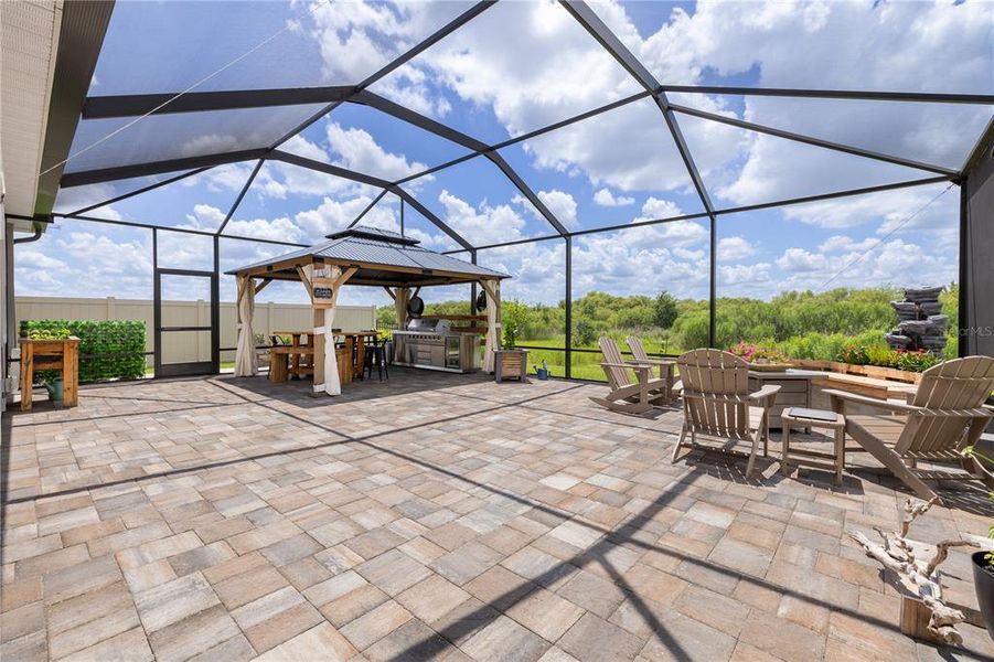 Exterior details and patio area of a home in Farm at Varrea, Plant City (Image 31).