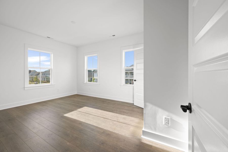 Spacious, unfurnished interior of a new home in The Domus Collection at Midtown Nexton, Summerville (Image 41).