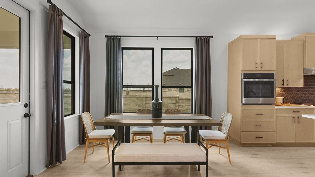 Representative furnished interior of a home built from the Mariah by Chesmar Homes in University Heights, Round Rock (Image 16).