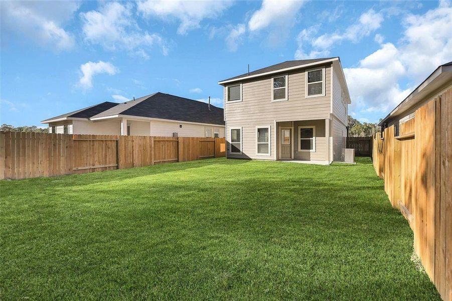 Exterior details and patio area of a home in River Ranch, Dayton (Image 3). Exterior details and patio area of a home in River Ranch, Dayton (Image 3).