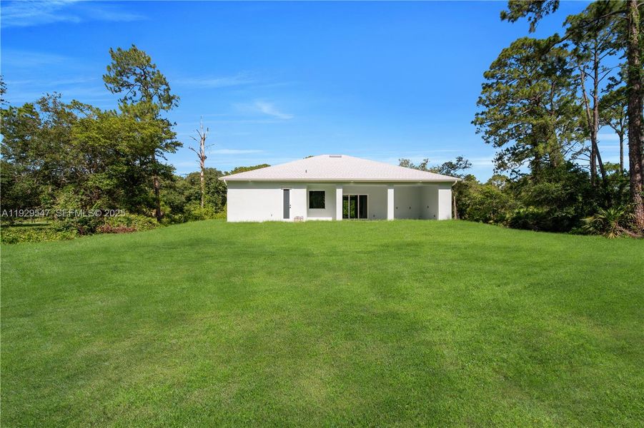 Exterior details and patio area of a home in , Lehigh Acres (Image 28). Exterior details and patio area of a home in , Lehigh Acres (Image 28).