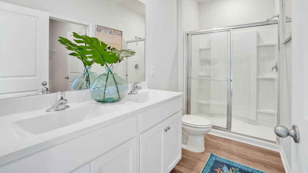 Representative furnished interior of a home built from the LEWIS by D.R. Horton in The Cottages at Blake Farm, Wilmington (Image 28).