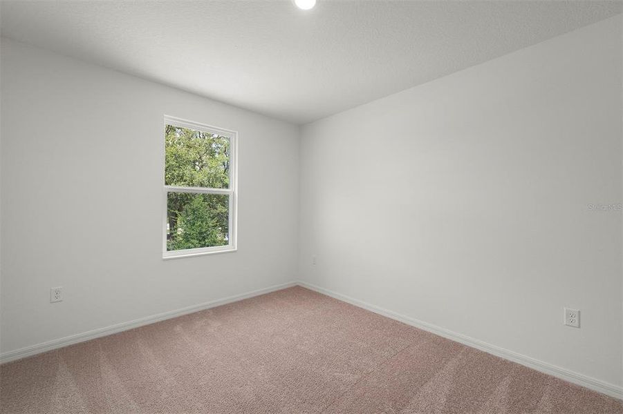 Spacious, unfurnished interior of a new home in Tula Parc, Astatula (Image 9).