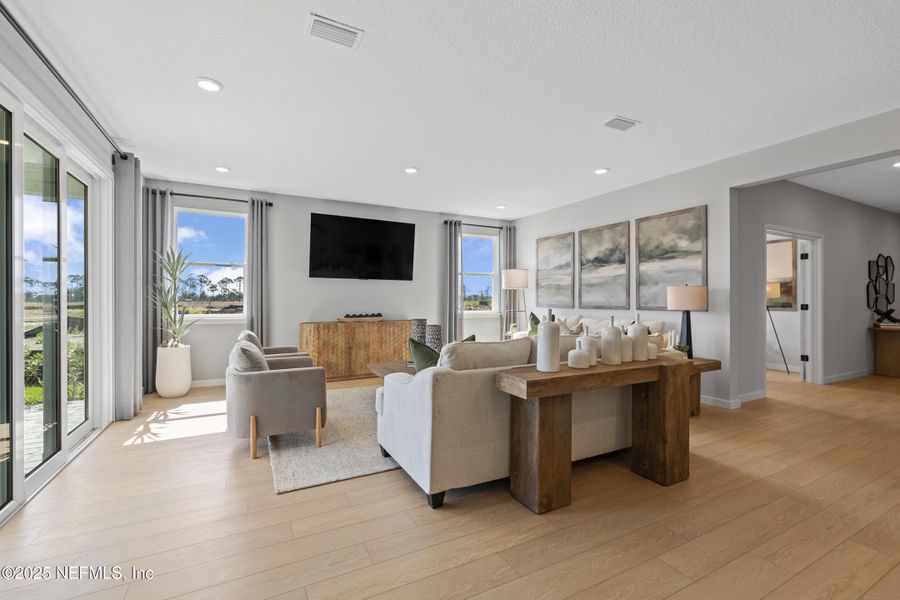 Furnished interior view inside a new home in The Cypress Series at Reserve East, Flagler Beach (Image 6).