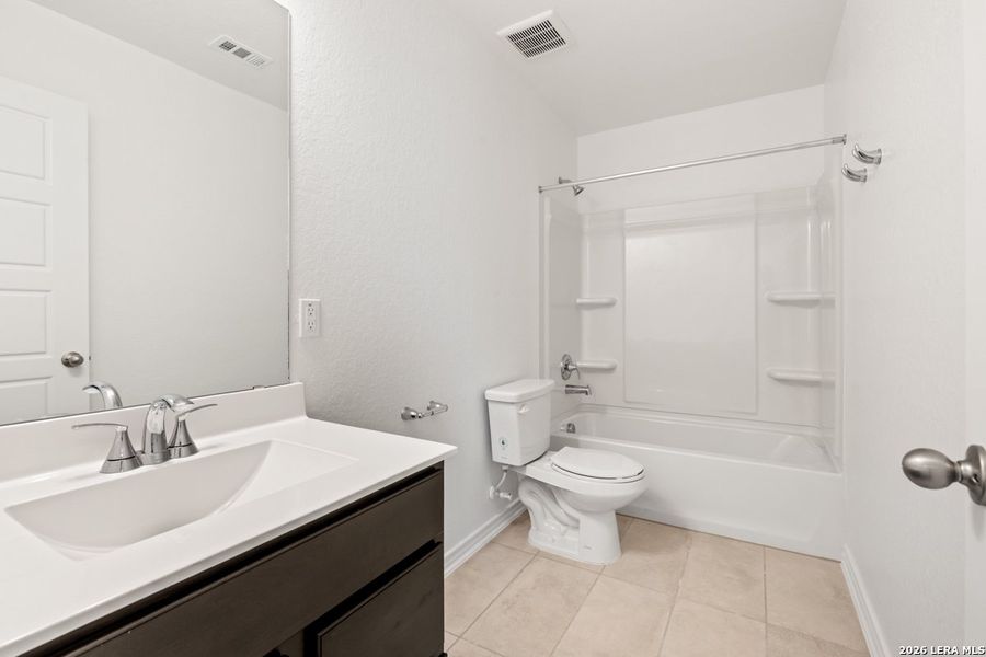 Furnished interior view inside a new home in Preserve at Culebra - Villa Collection, San Antonio (Image 10). Furnished interior view inside a new home in Preserve at Culebra - Villa Collection, San Antonio (Image 10).