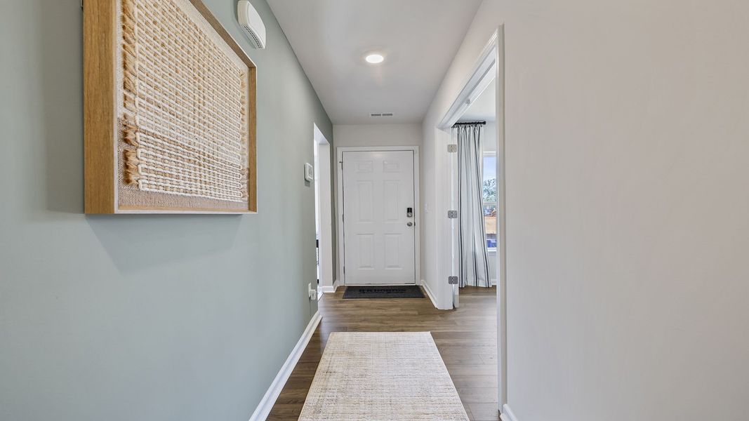 Spacious, unfurnished interior of a new home in Bentley Park, Greenwood (Image 22).