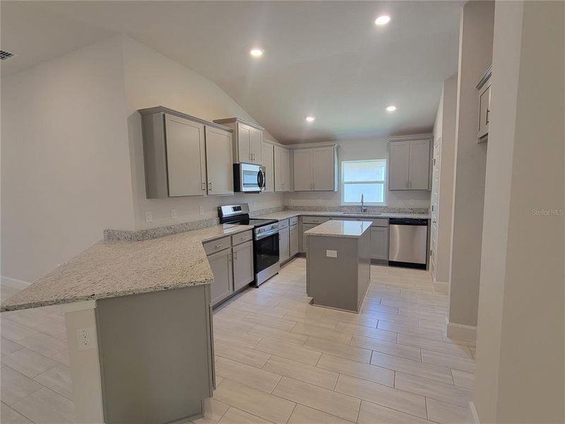 Furnished interior view inside a new home in Abbey Glen, Dade City (Image 8).