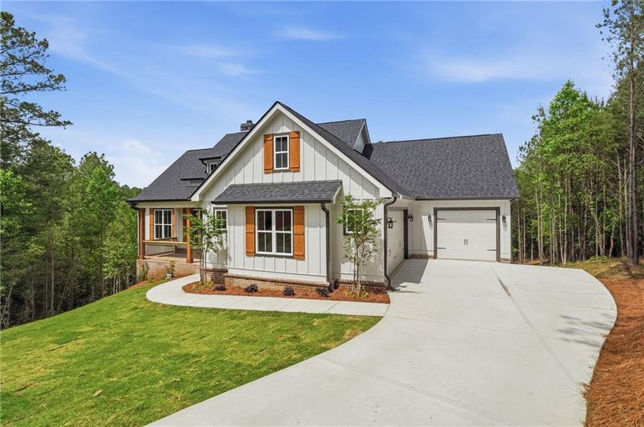 Front exterior of a new home in , Jasper, GA, highlighting curb appeal (Image 2). Front exterior of a new home in , Jasper, GA, highlighting curb appeal (Image 2).