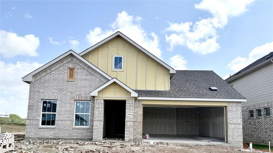 In-progress construction of a new home in Carillon, Manor, TX (Image 4). In-progress construction of a new home in Carillon, Manor, TX (Image 4).