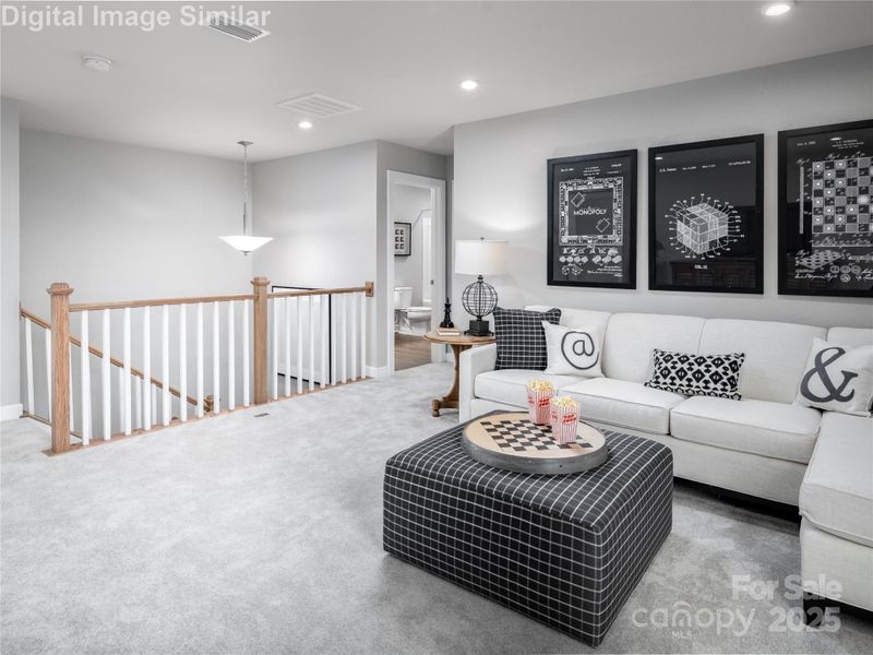 The perfect in-between — this welcoming space nestled between two bedrooms is ideal for a quick chat, shared playtime, or a quiet moment together. The perfect in-between — this welcoming space nestled between two bedrooms is ideal for a quick chat, shared playtime, or a quiet moment together.