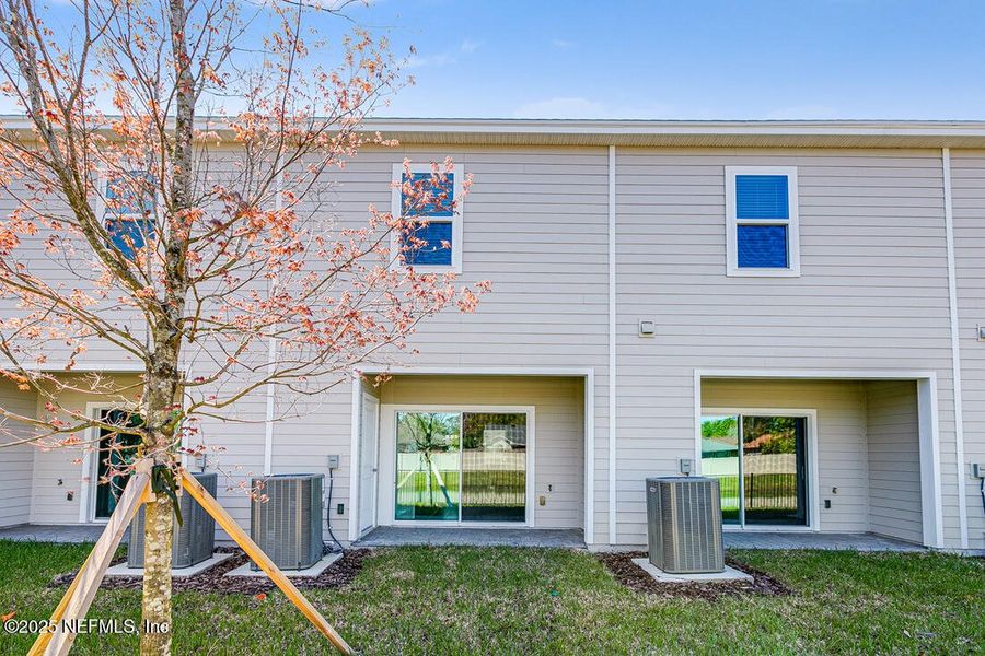 Front exterior of a new home in Sabal Terrace, Jacksonville, FL, highlighting curb appeal (Image 22). Front exterior of a new home in Sabal Terrace, Jacksonville, FL, highlighting curb appeal (Image 22).