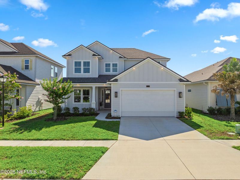 Front exterior of a new home in , Ponte Vedra, FL, highlighting curb appeal (Image 22).