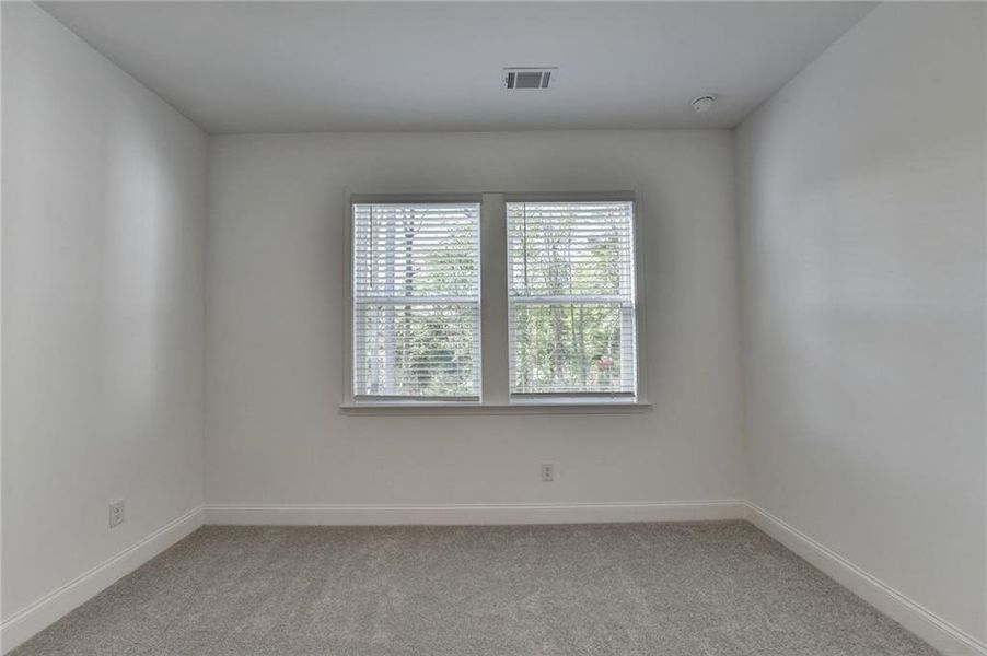 Spacious, unfurnished interior of a new home in Bailey Fence, Dacula (Image 65).