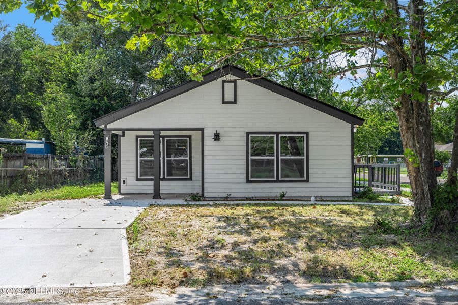 Front exterior of a new home in , Jacksonville, FL, highlighting curb appeal (Image 1). Front exterior of a new home in , Jacksonville, FL, highlighting curb appeal (Image 1).