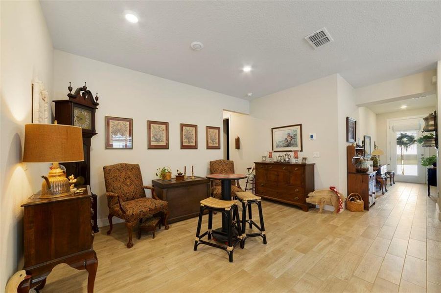 Furnished interior view inside a new home in Del Webb Sunbridge, St. Cloud (Image 14).