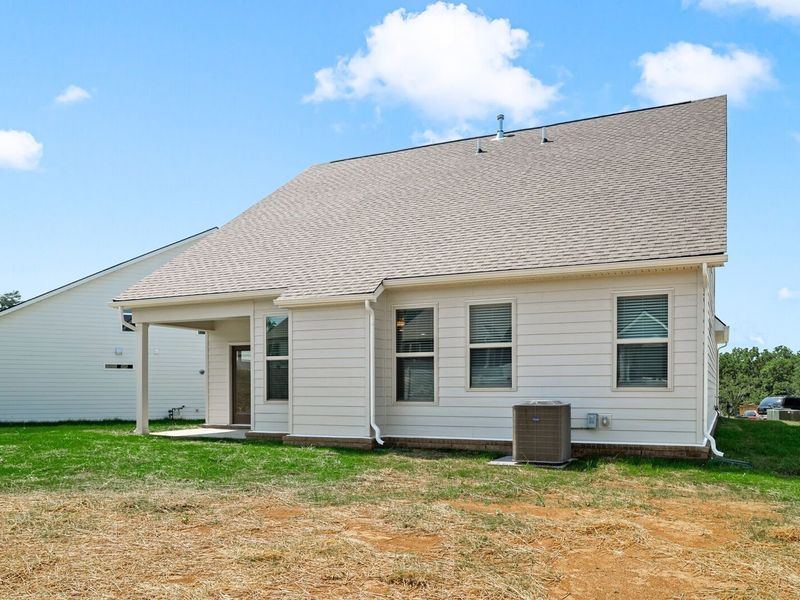Exterior details and patio area of a home in Woods Crossing, Gallatin (Image 33).