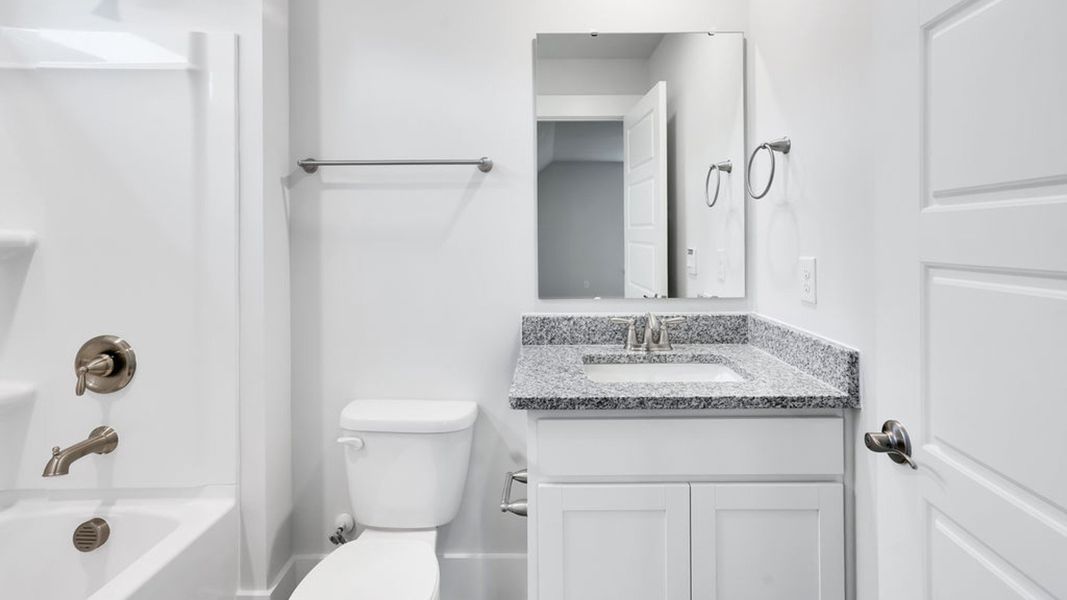 Furnished interior view inside a new home in Magnolia Ridge at Blake Farm, Wilmington (Image 14).