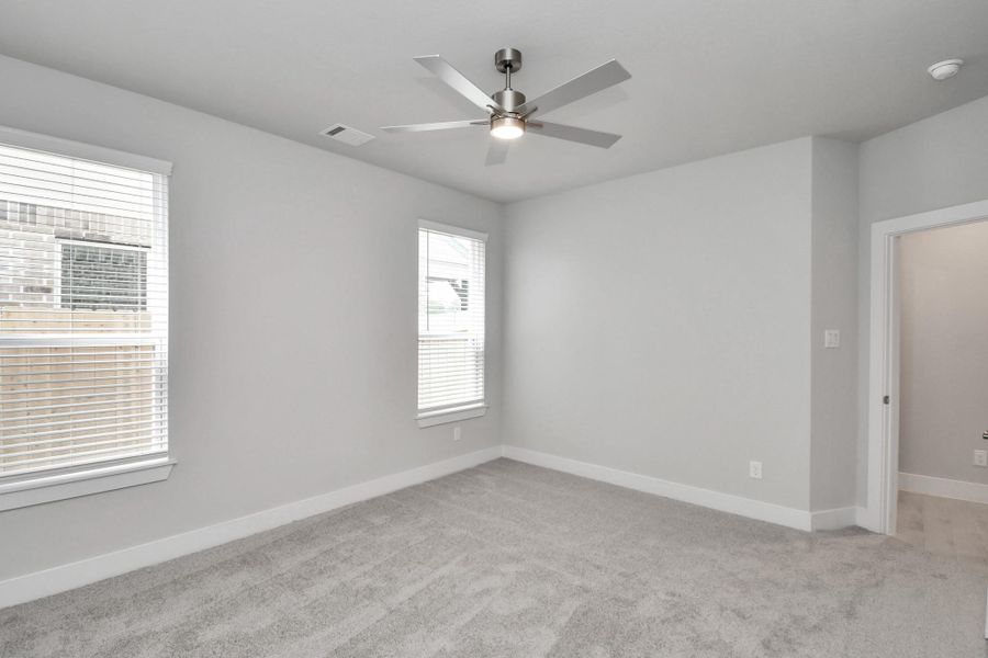 Generously sized secondary bedrooms featuring spacious closets, soft and inviting carpeting underfoot, large windows allowing plenty of natural light, and the added touch of privacy blinds for your personal retreat. Generously sized secondary bedrooms featuring spacious closets, soft and inviting carpeting underfoot, large windows allowing plenty of natural light, and the added touch of privacy blinds for your personal retreat.