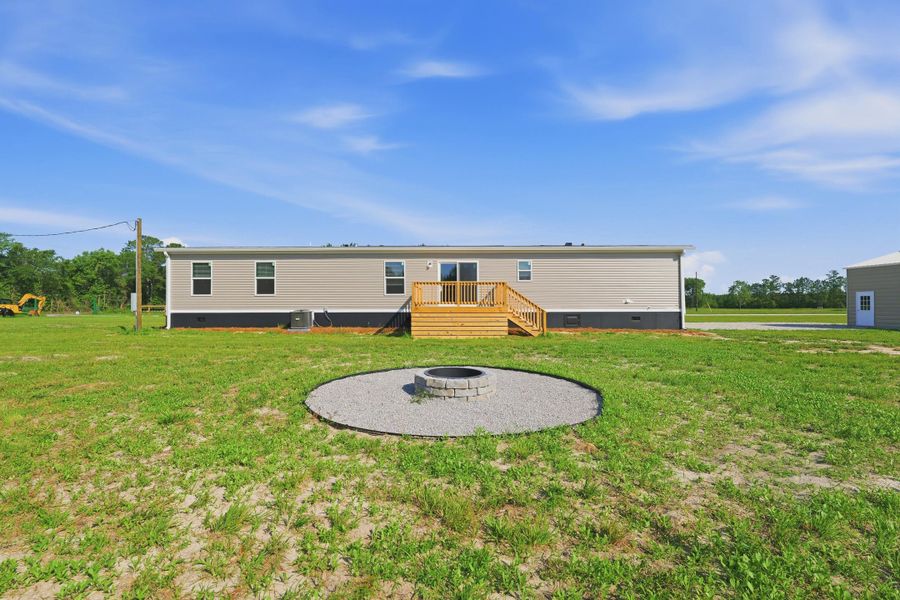 Exterior details and patio area of a home in , Cross (Image 24).