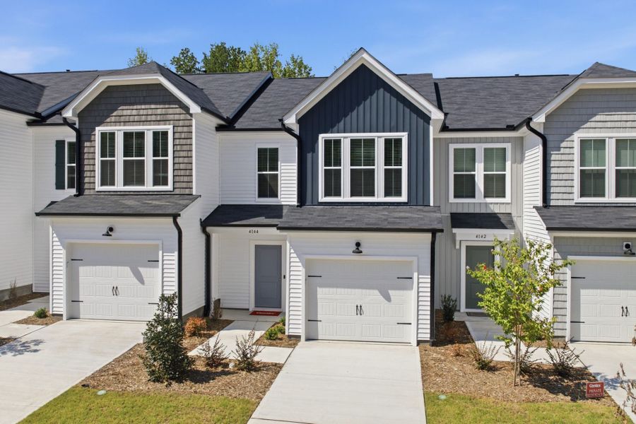 Front exterior of a new home in Carpenter Falls, Durham, NC, highlighting curb appeal (Image 28).