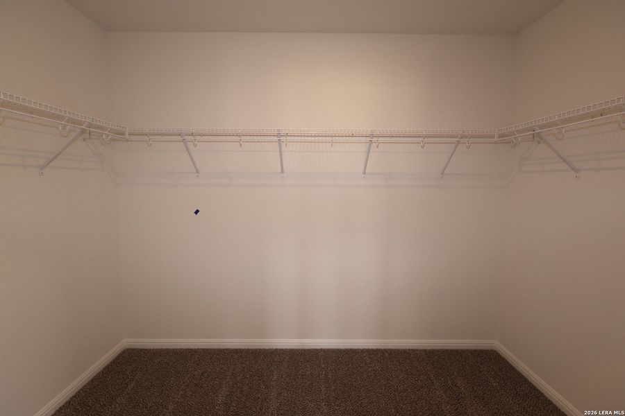 Spacious, unfurnished interior of a new home in Verano Farms, San Antonio (Image 21).