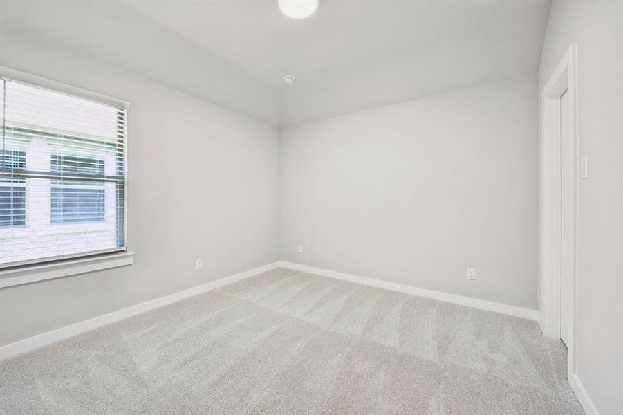Bedroom in the Mesquite home plan by Trophy Signature Homes – REPRESENTATIVE PHOTO