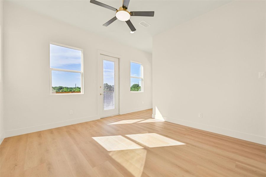 Primary bedroom has a door to private balcony with unobstructed views to Taylor Lake Primary bedroom has a door to private balcony with unobstructed views to Taylor Lake