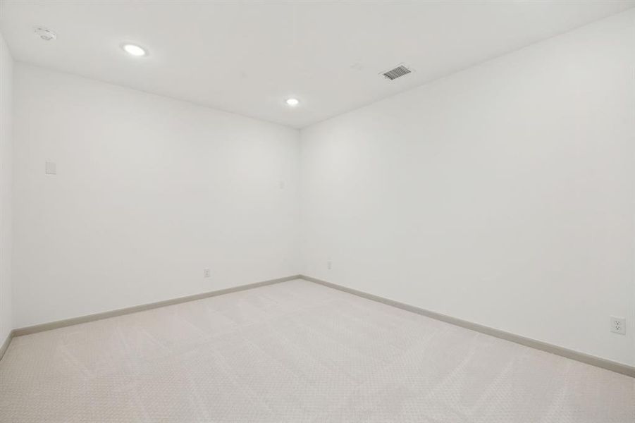 This spacious media room with adjacent game room create the ultimate entertainment zone! This spacious media room with adjacent game room create the ultimate entertainment zone!