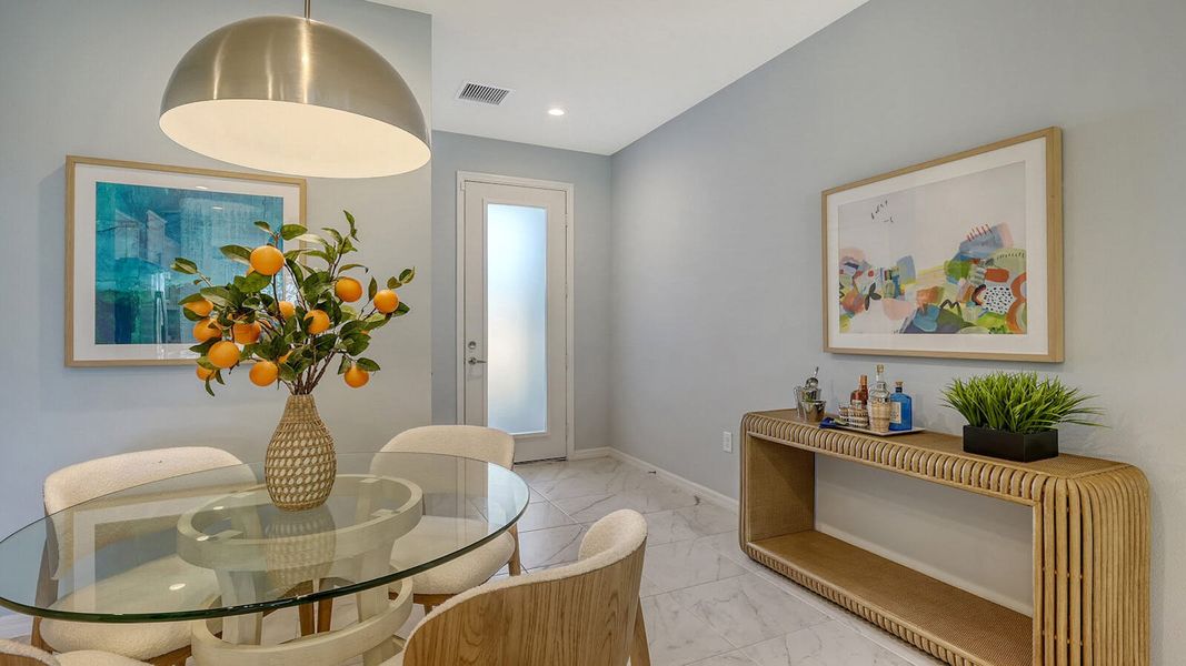 Furnished interior view inside a new home in Grand Park Real Estate and Homes for Sale in Sarasota, FL - Neal Communities, Sarasota (Image 18).
