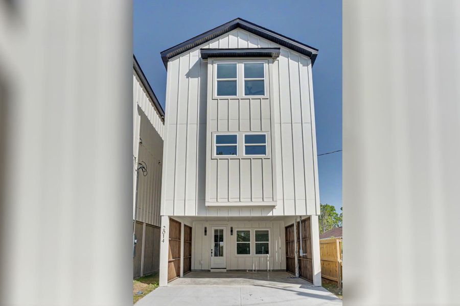 Front exterior of a new home in , North Charleston, SC, highlighting curb appeal (Image 2). Front exterior of a new home in , North Charleston, SC, highlighting curb appeal (Image 2).