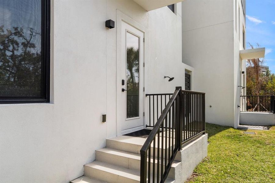 Exterior details and patio area of a home in , New Smyrna Beach (Image 28).