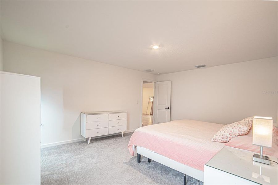 Furnished interior view inside a new home in The Crossing at Palm River, Tampa (Image 9).