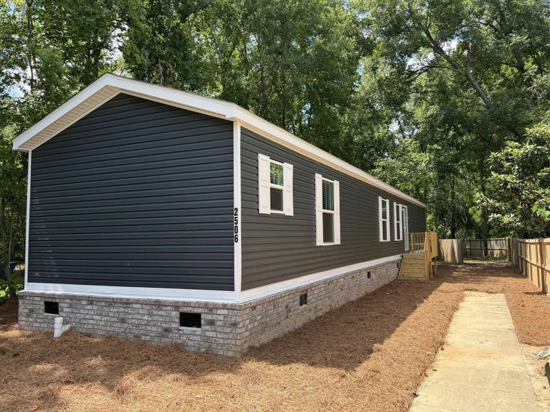 Exterior details and patio area of a home in , North Charleston (Image 19).