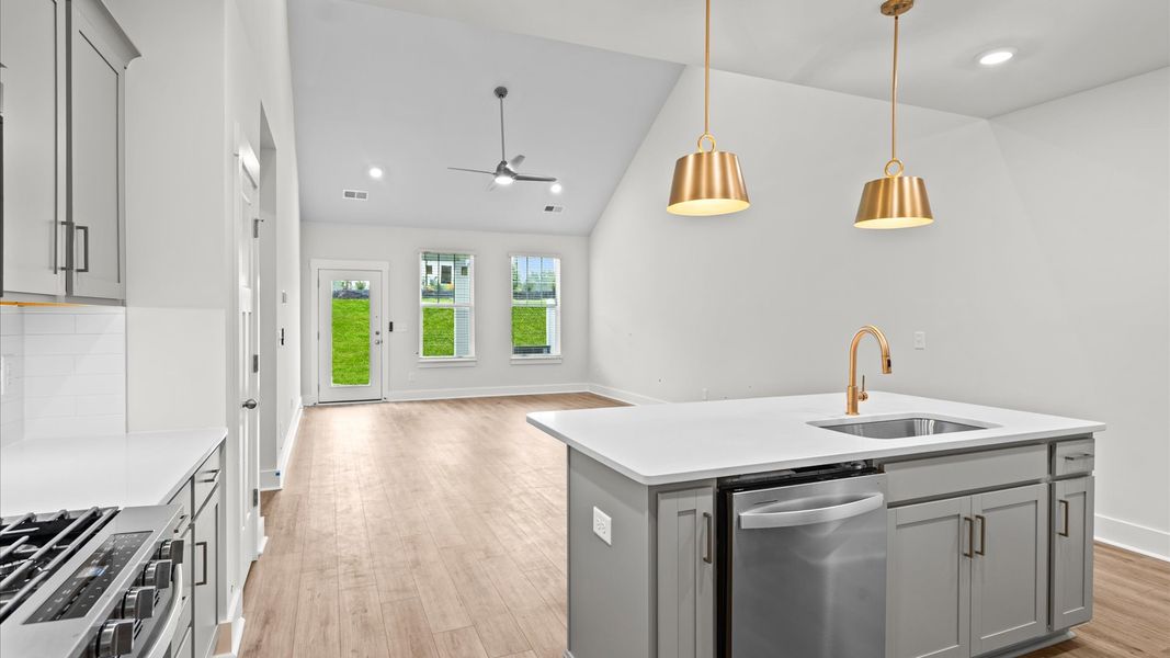 First-class finishes and a thoughtfully scaled island highlight this elegant kitchen space at Silo Ridge in Anderson, SC