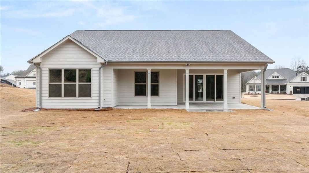 Exterior details and patio area of a home in Soleil Belmont Park, Canton (Image 29).