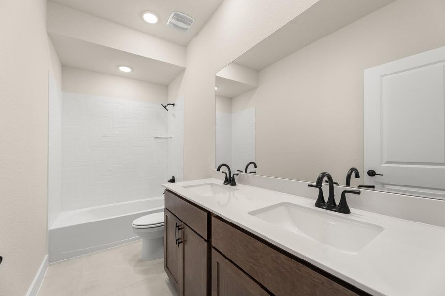 Furnished interior view inside a new home in Garden Collection at Union Park, Little Elm (Image 10).