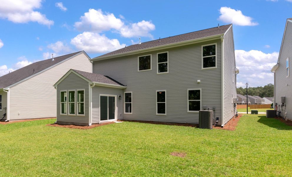 Exterior details and patio area of a home in Oakley Pointe, Moncks Corner (Image 4).