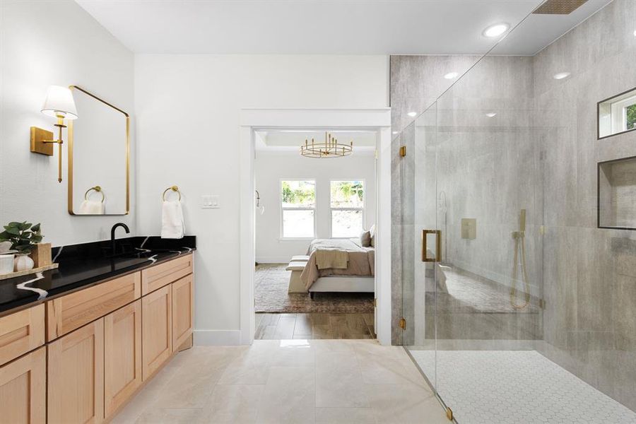 Bathroom with vanity, tile patterned floors, and walk in shower