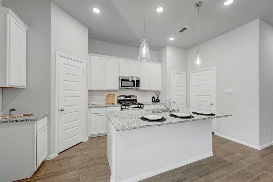 Furnished interior view inside a new home in Sagebrook, Argyle (Image 13). Furnished interior view inside a new home in Sagebrook, Argyle (Image 13).