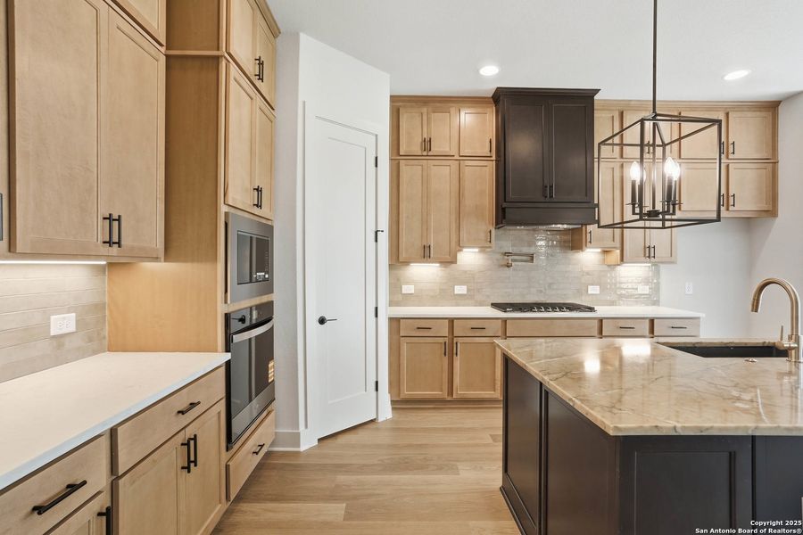 Furnished interior view inside a new home in Kinder Ranch 70's, San Antonio (Image 11).