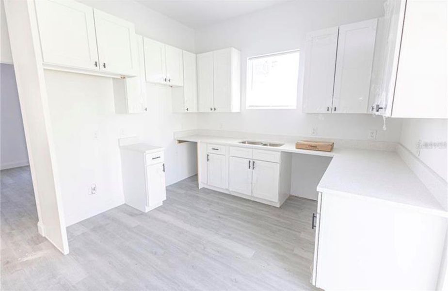 Furnished interior view inside a new home in , Lake Panasoffkee (Image 6).