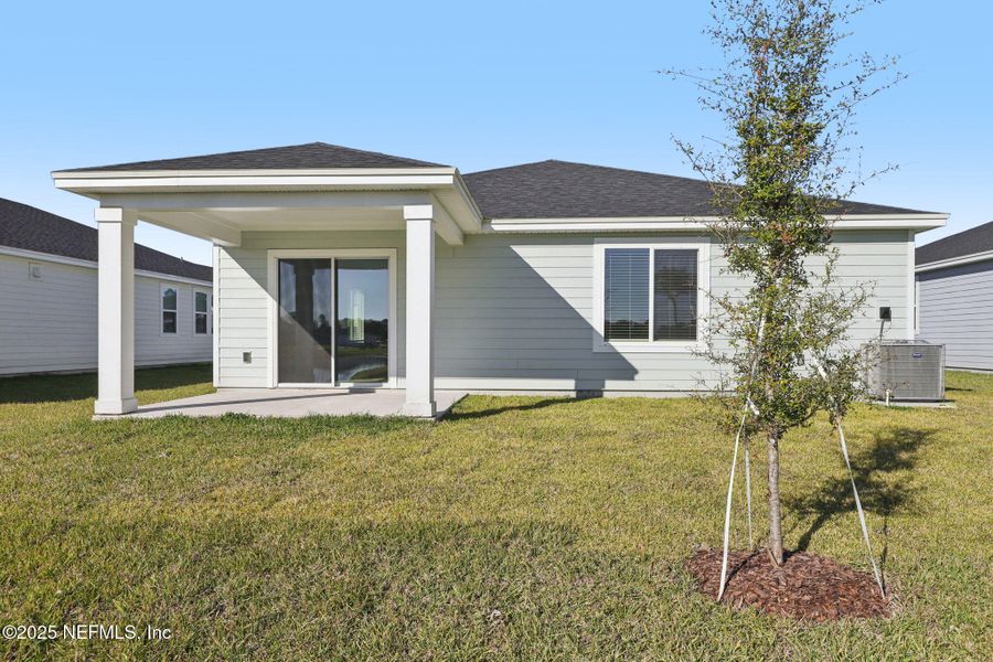 Exterior details and patio area of a home in Cypress Meadows - Signature Series, Jacksonville (Image 20).