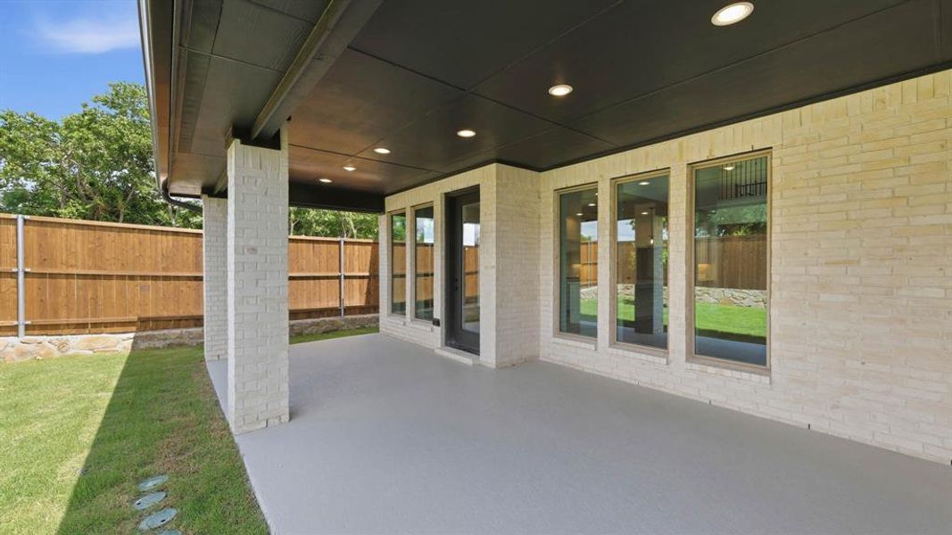 Exterior details and patio area of a home in The Heights at Uptown Celina, Celina (Image 3).